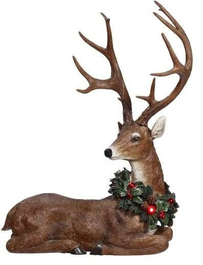 21-inch brown reclining reindeer figurine with large antlers and a festive holiday wreath.