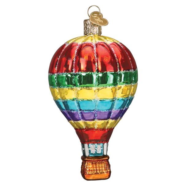 Vibrant rainbow-striped glass hot air balloon ornament with glitter accents and a brown basket.