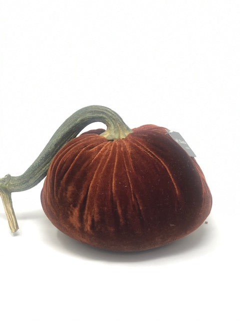 Handmade orange velvet pumpkin with a natural stem.