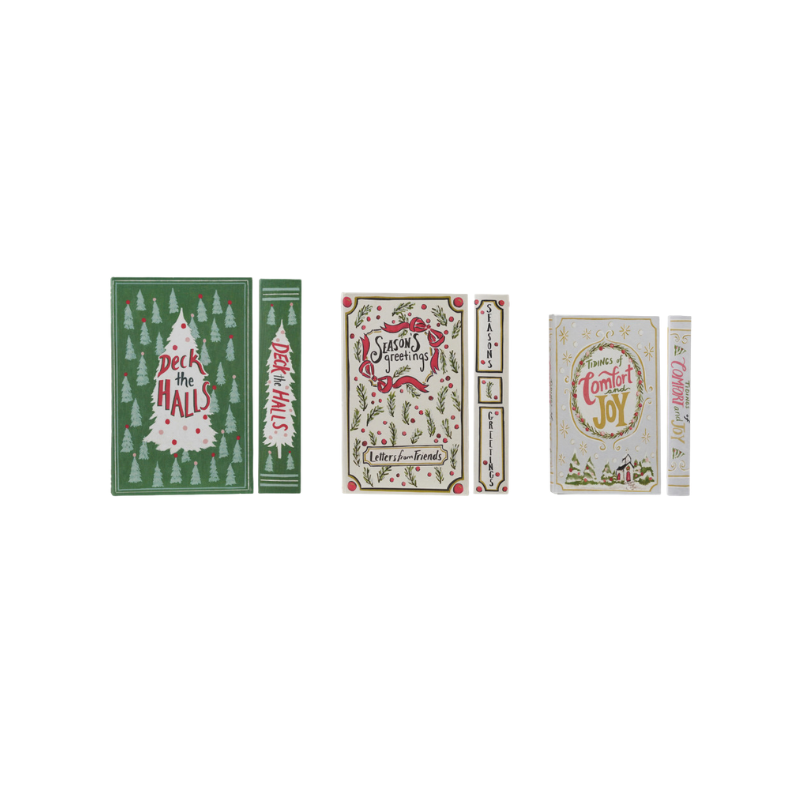 Set of 3 festive MDF and canvas book storage boxes with holiday designs and titles.