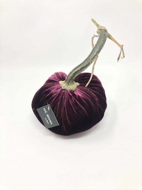 Handmade orange velvet pumpkin with a natural stem.