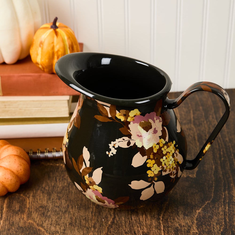Brown hand-glazed steel pitcher with handle featuring wild rose transfer pattern
