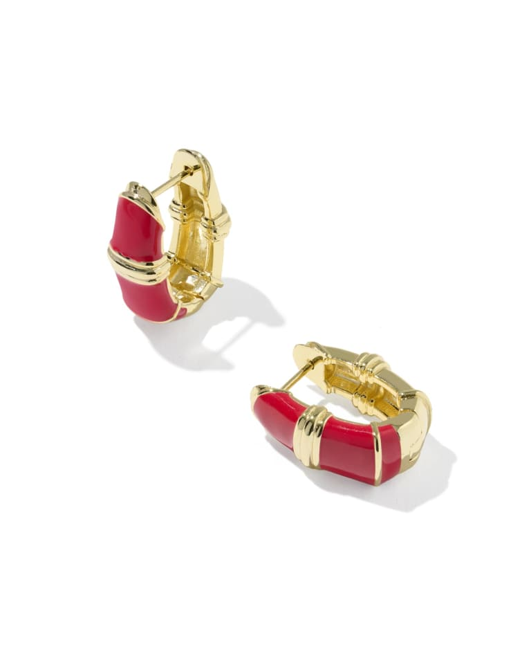 Courtney red enamel and 14k gold-plated huggie hoop earrings with textured metal detailing.