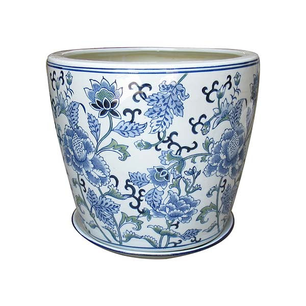 White ceramic planter shaped like a peony flower with green leaf accents.