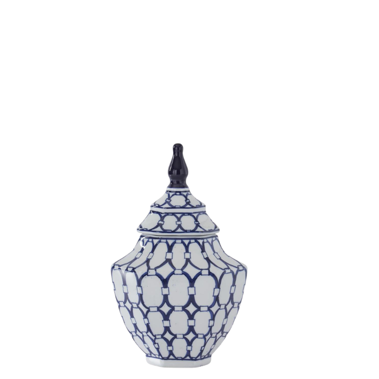 Blue and white porcelain lidded container with an ornate oval geometric print and pointed finial.