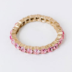 Pink sparkle stretch bracelet with a diameter of approximately 2.5 inches.