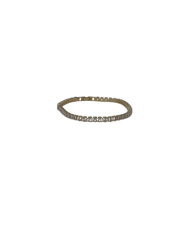 Gold tennis bracelet featuring a row of square-cut clear crystals with a secure clasp closure.