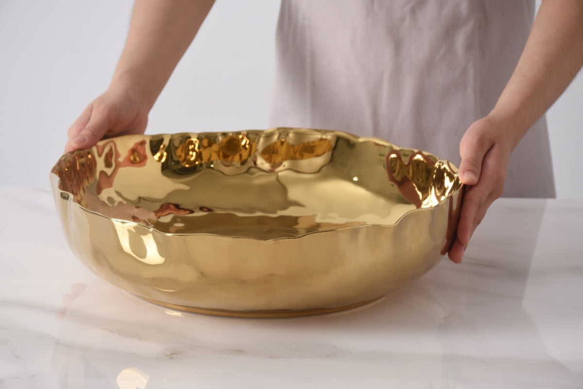 Extra large shallow porcelain bowl with gold finish in Portofino color