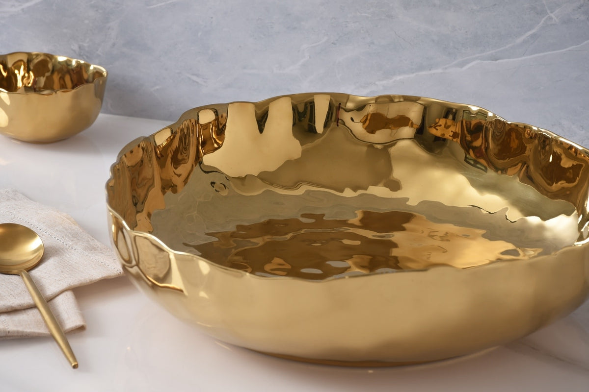 Extra Large Shallow Bowl in Portofino gold finish made from high-fired porcelain with a simple elegant silhouette.
