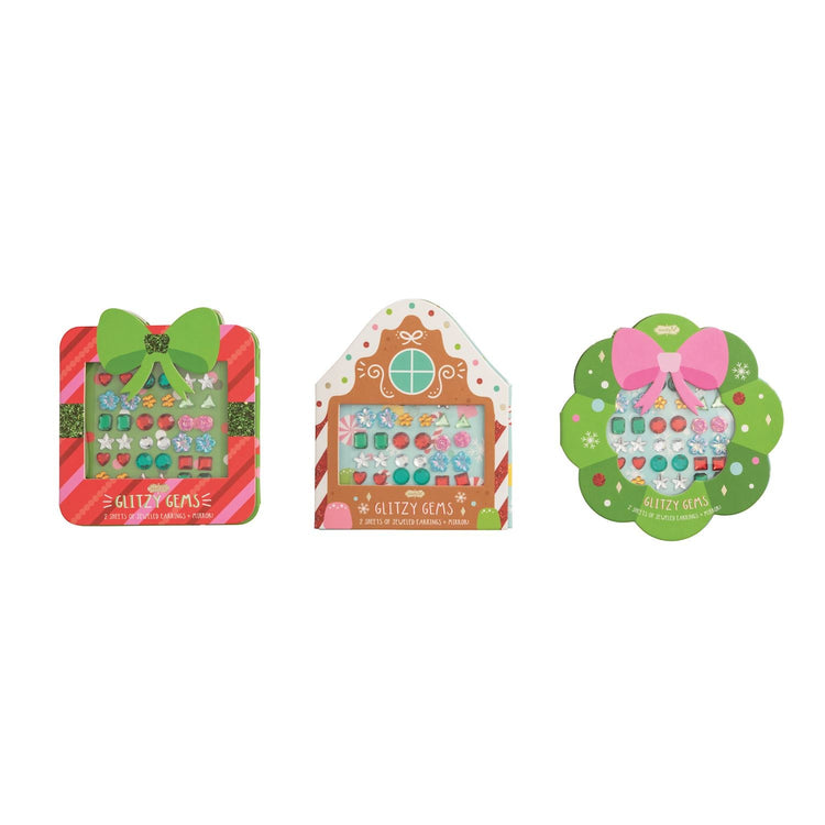 Three festive Christmas Glitzy Gems sticker earring sets in gift box, gingerbread, and wreath shapes.