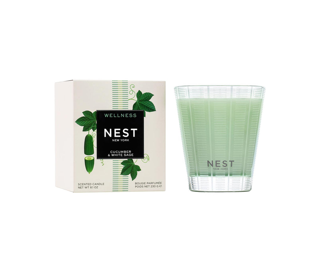 Nest Classic Candle in a clear glass jar with an off-white wax pillar.