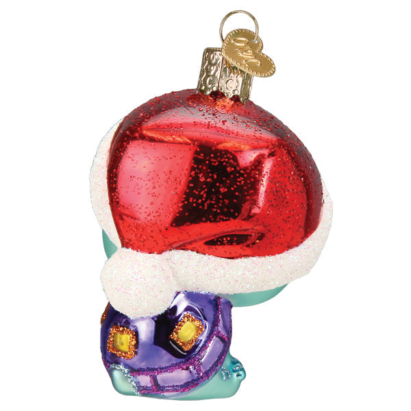 Littlest Pet Shop Bev turtle ornament wearing a red glittery Santa hat and purple shell.