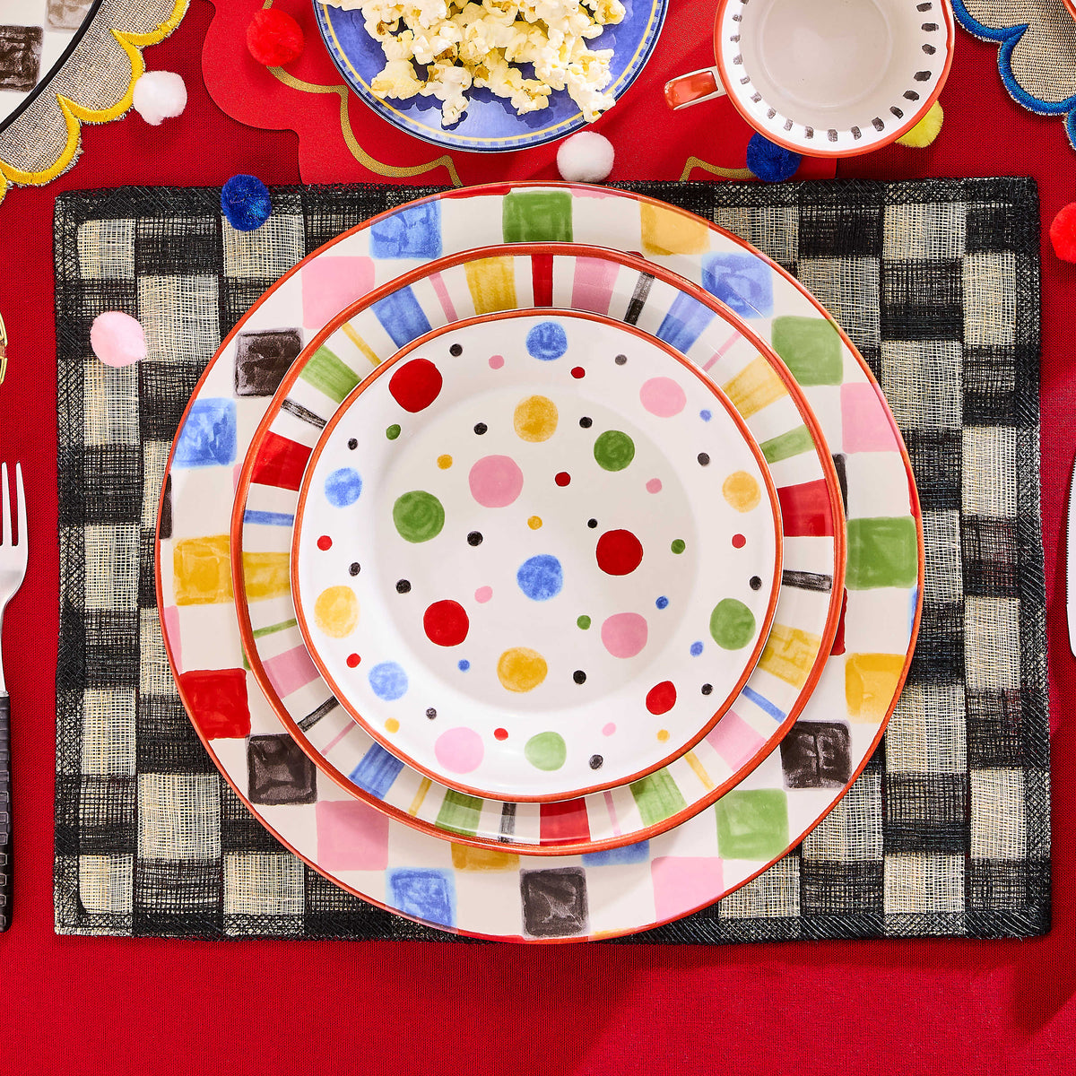 Day at the Fair Salad Plate with colorful polka dots stacked on striped and checkered plates.