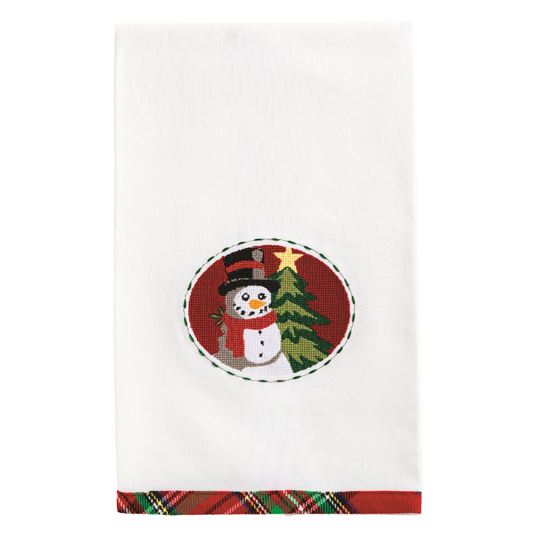 White cotton hand towel with a needlepoint snowman and tree design and a red tartan hem.