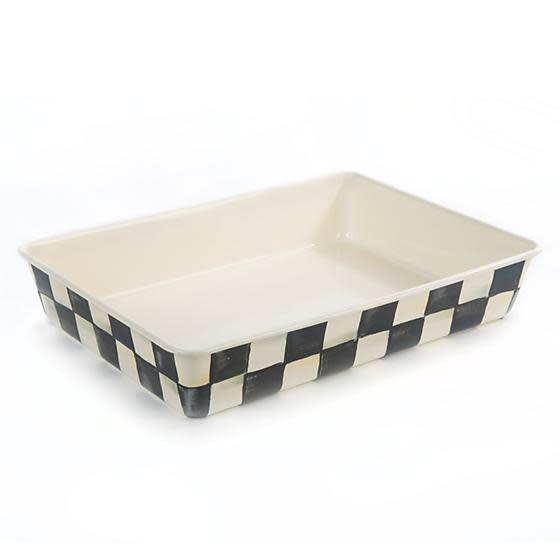 Rectangular enamel baking pan with a cream interior and black and white checkered exterior.