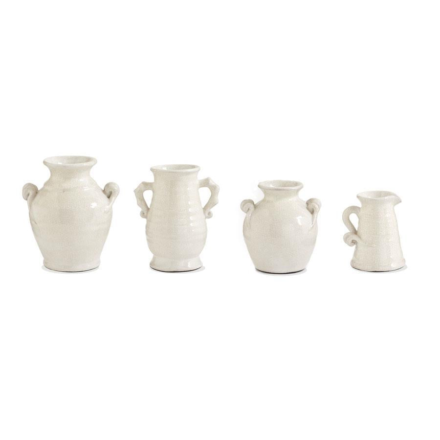 Set of European ceramic vases in neutral tones with a classic rounded silhouette.