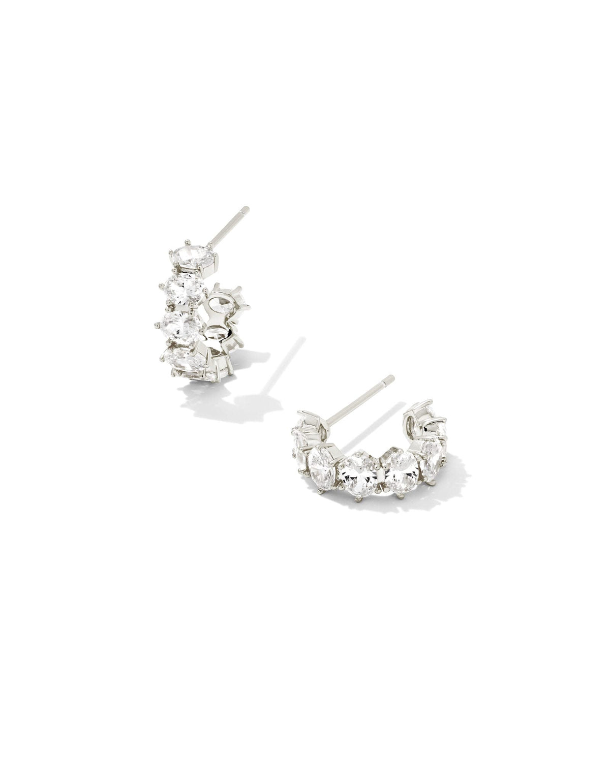Cailin crystal huggie earrings with earpost closure in clear gemstone detail.