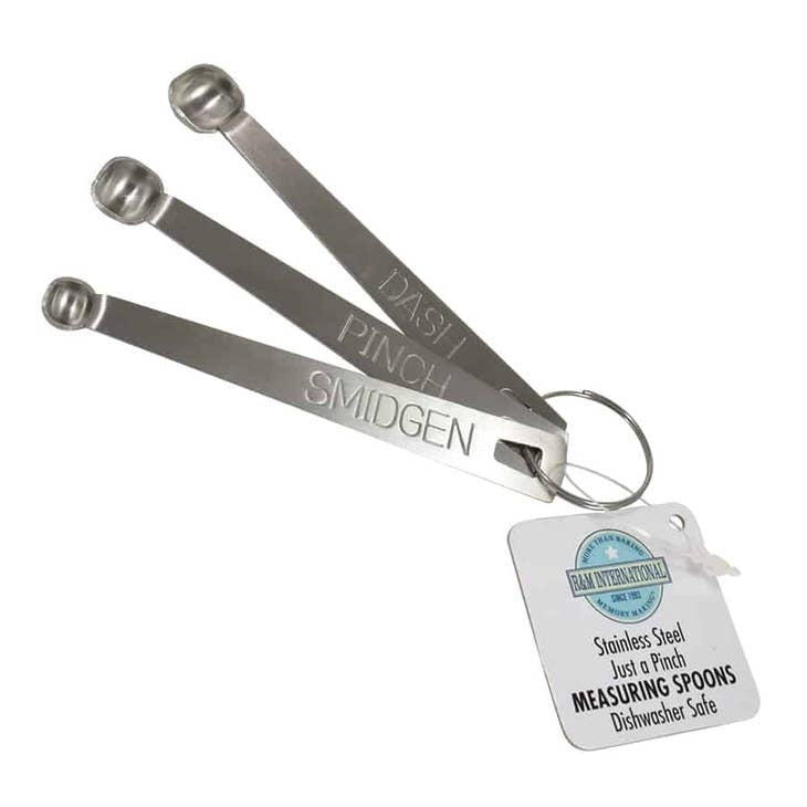 Three stainless steel measuring spoons with rounded bottoms: Smidgen (1/32 tsp), Pinch (1/16 tsp), and Dash (1/8 tsp).