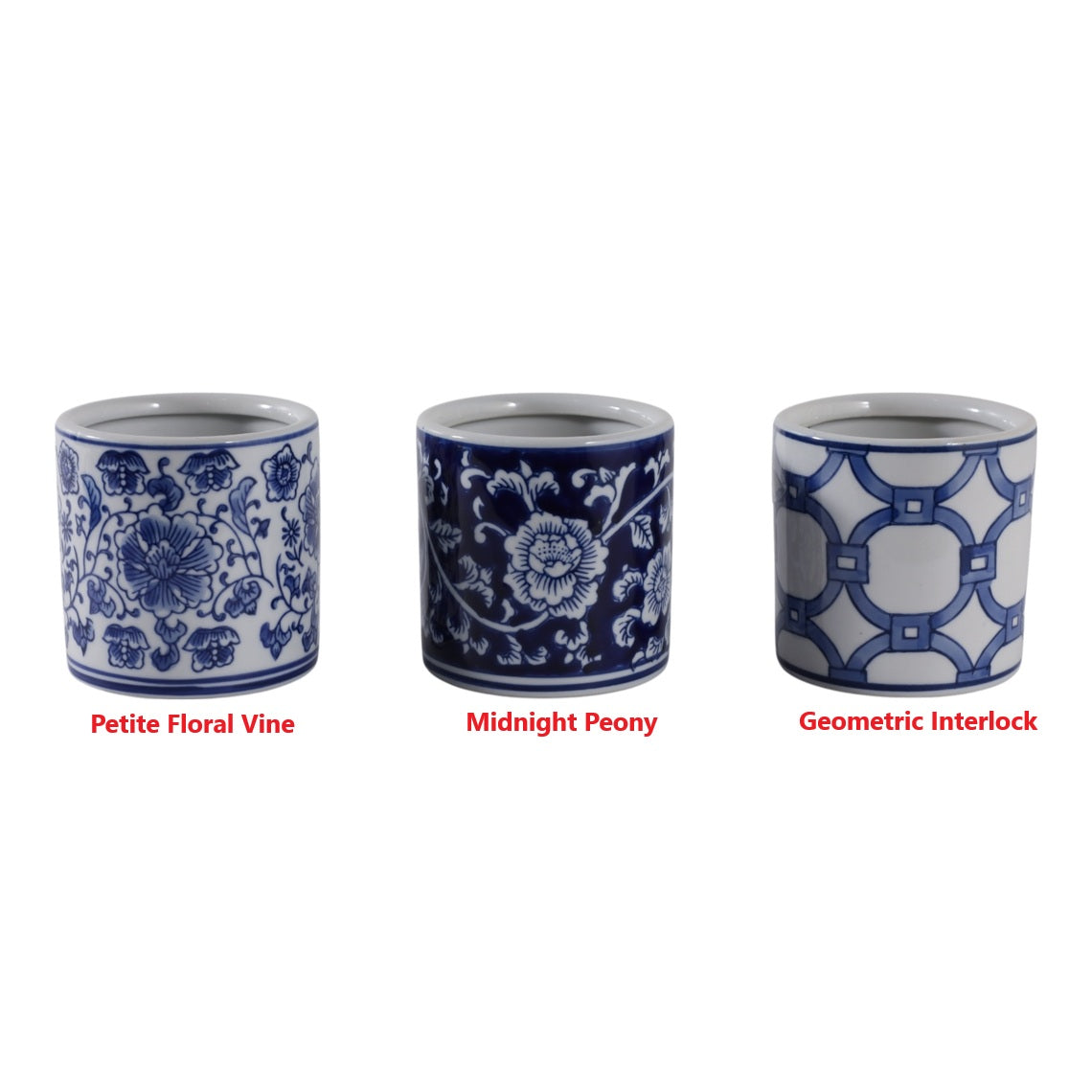 Three blue and white ceramic chinoiserie pencil cups in floral, peony, and geometric patterns.