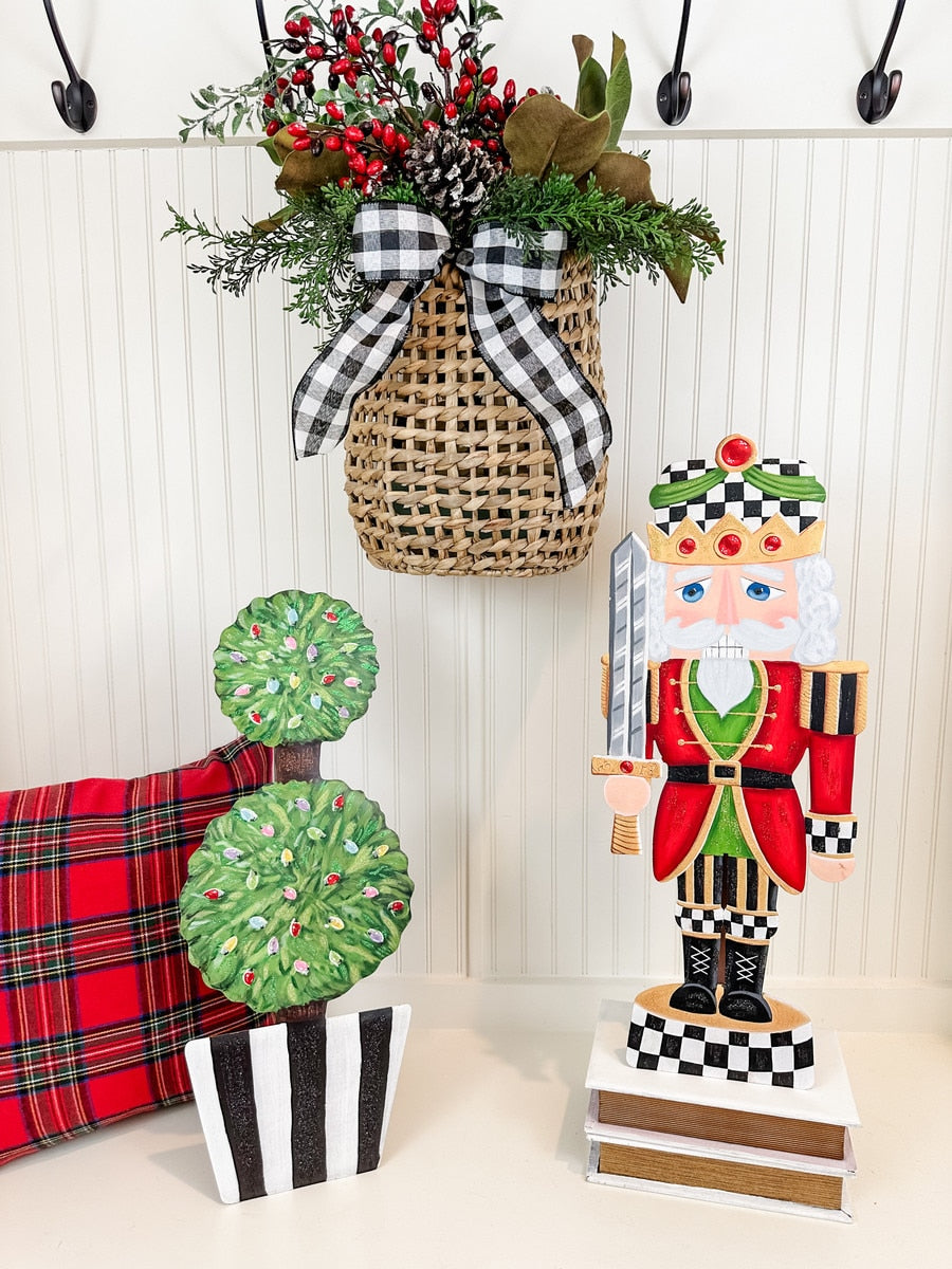 Medium wooden nutcracker with a classic soldier silhouette in dark brown finish.