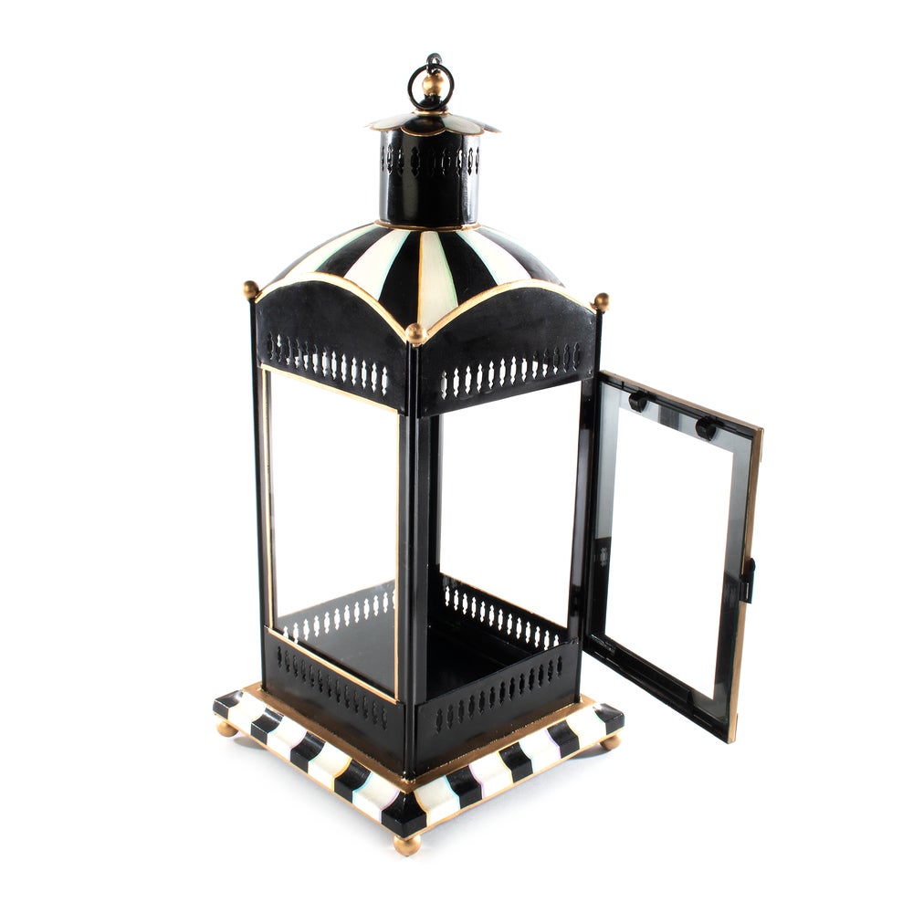 Hand-painted iron pagoda candle lantern with vertical cutouts in black.