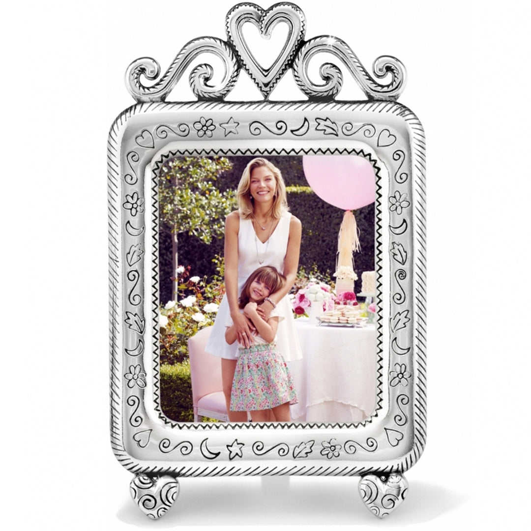 Silver-plated Good Times Frame with heart and scroll details, holding a photo of a woman and child.