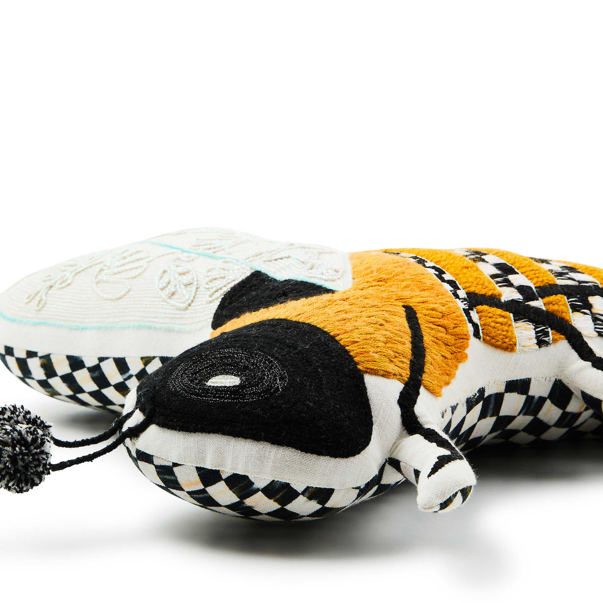Bee shaped throw pillow with black and white checkered patterns and yellow embroidered details.