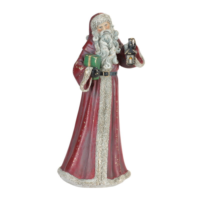10-inch tall vintage-style Santa figurine in a red robe holding a green gift and a black lantern.