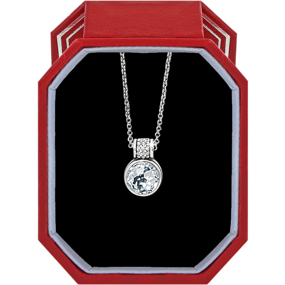 Meridian Aurora Petite Necklace with a crystal pendant in a red octagonal gift box.