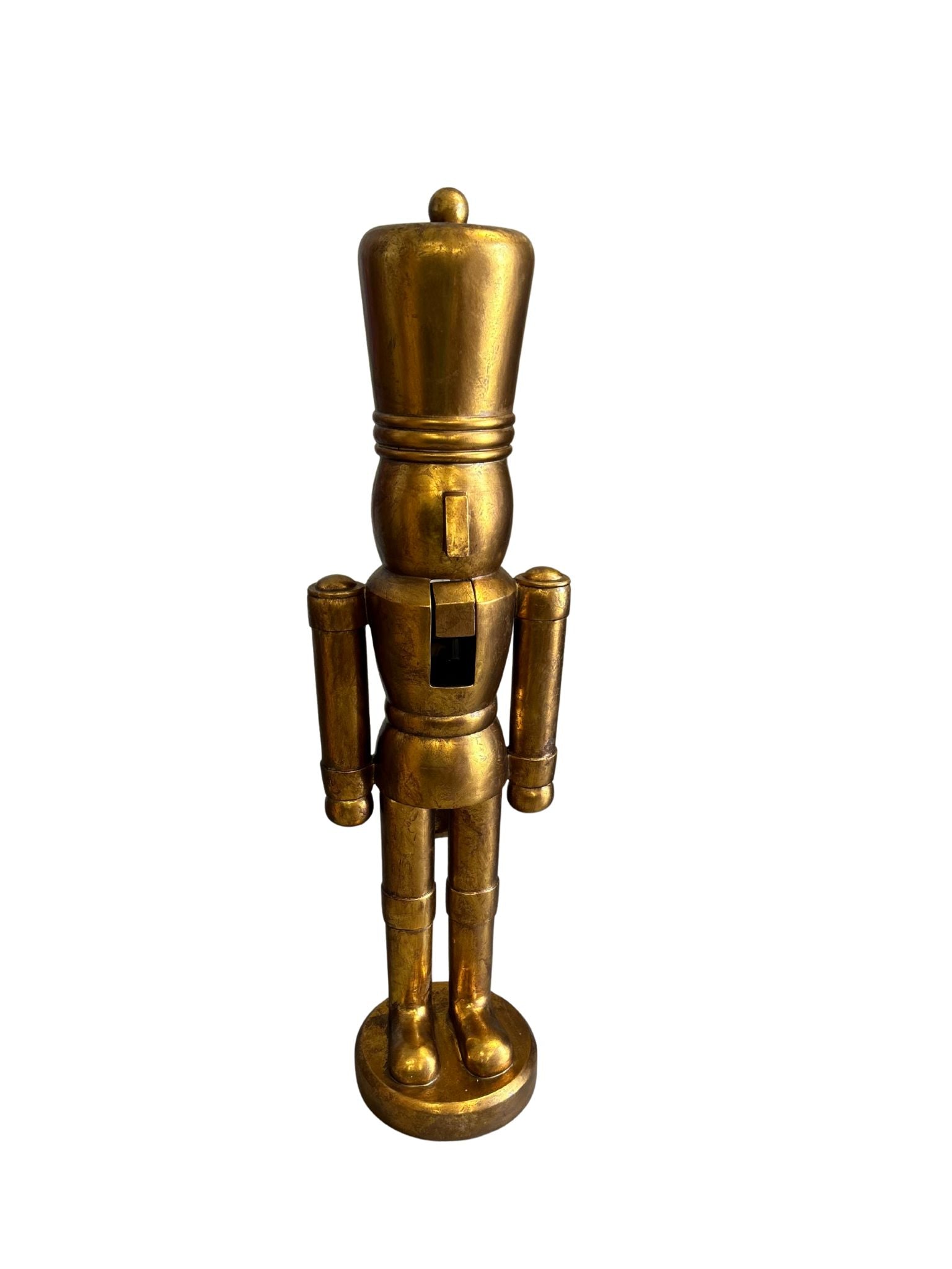 Gold resin nutcracker soldier statue standing upright with a detailed uniform.