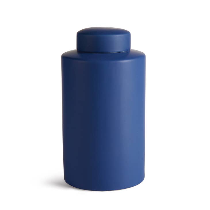 Small Barclay Butera Westcliff cylinder jar in white ceramic with a textured ribbed body and smooth rim.