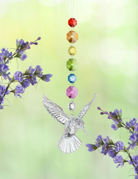 Rainbow beaded hummingbird ornament with multi-colored beads forming a detailed silhouette.