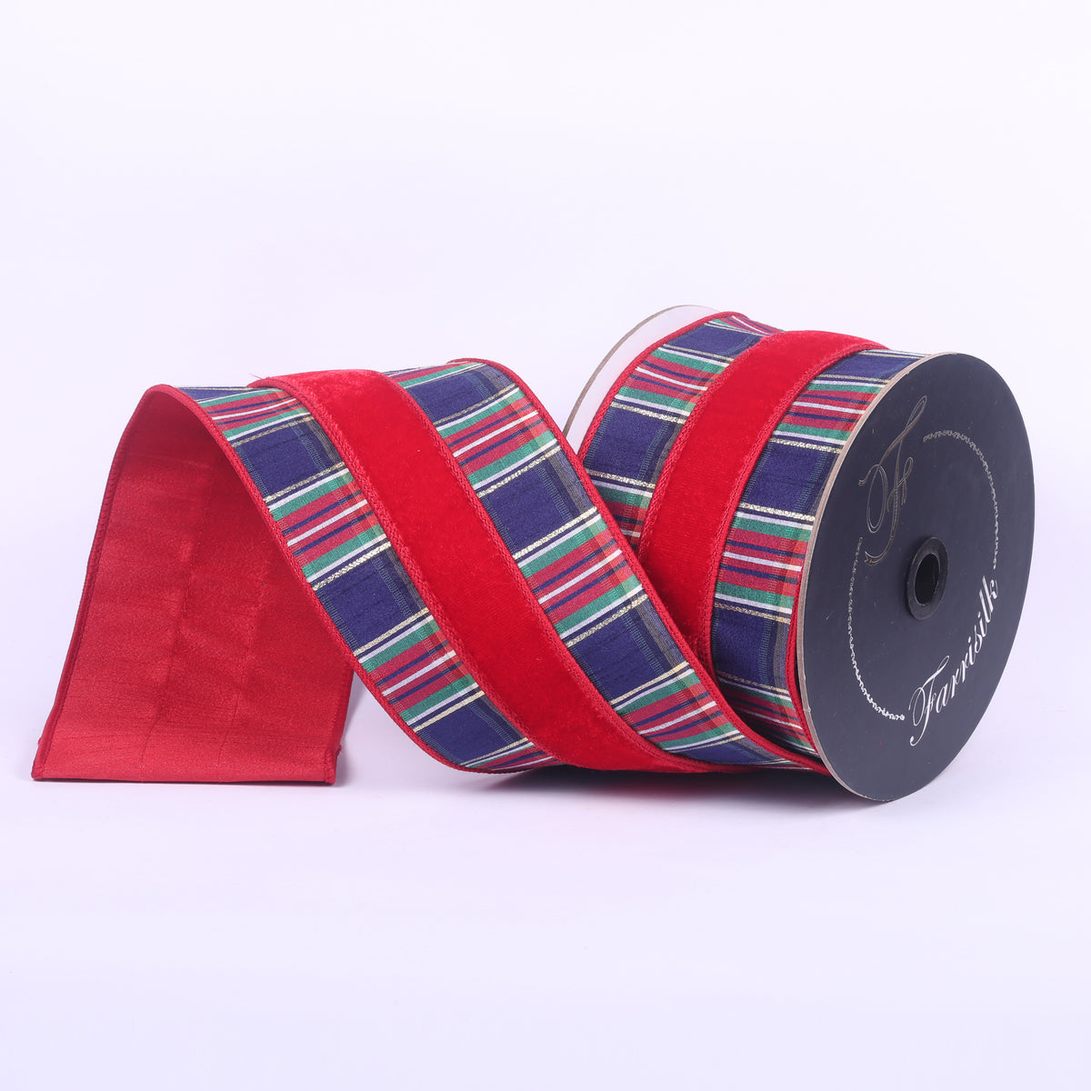 4 inch by 10 yard plaid plush ribbon with red, green, and navy stripes on a spool.