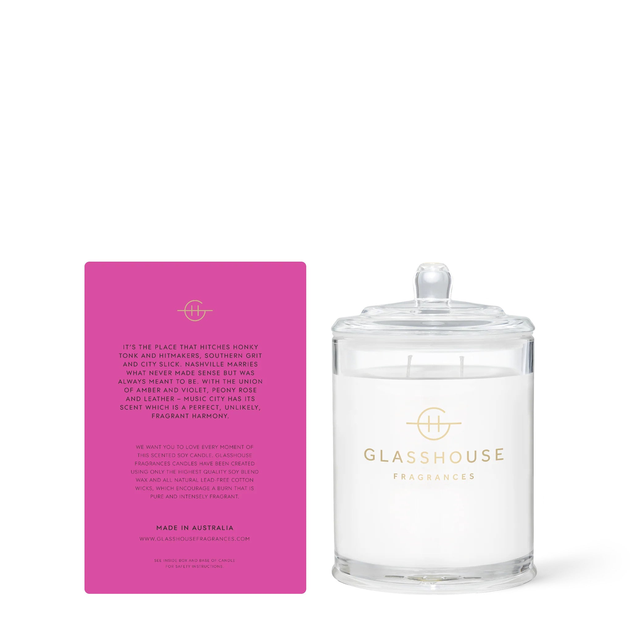 Music City Magic candle in a clear glass jar with white soy wax wicks.