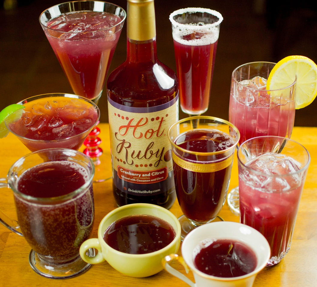 Bottle of Hot Ruby Cranberry Cider with cinnamon spices