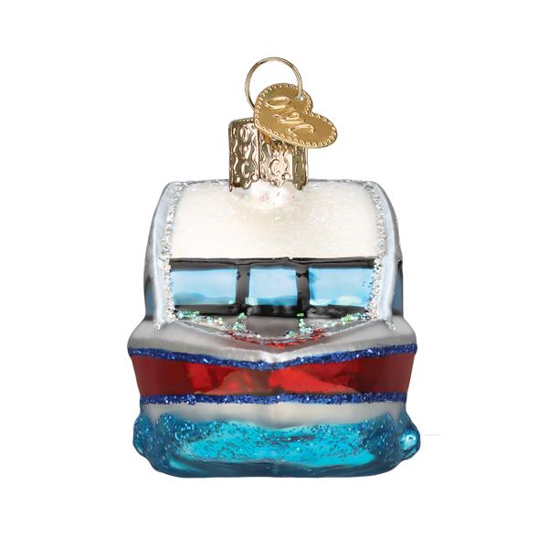 Front view of a glass ski boat Christmas ornament with silver, red, and blue glitter accents.
