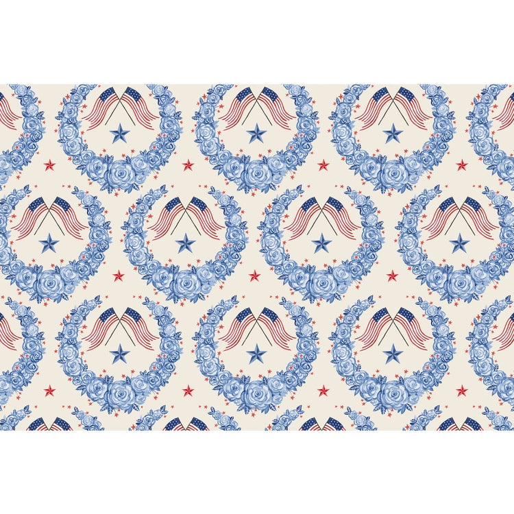 Hester & Cook paper placemats with a pattern of blue floral wreaths, American flags, and red stars.