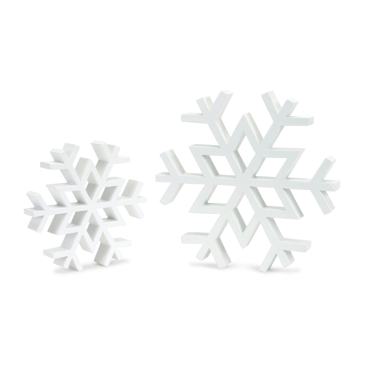 Two white wooden snowflake decorations in different sizes standing on a white background.
