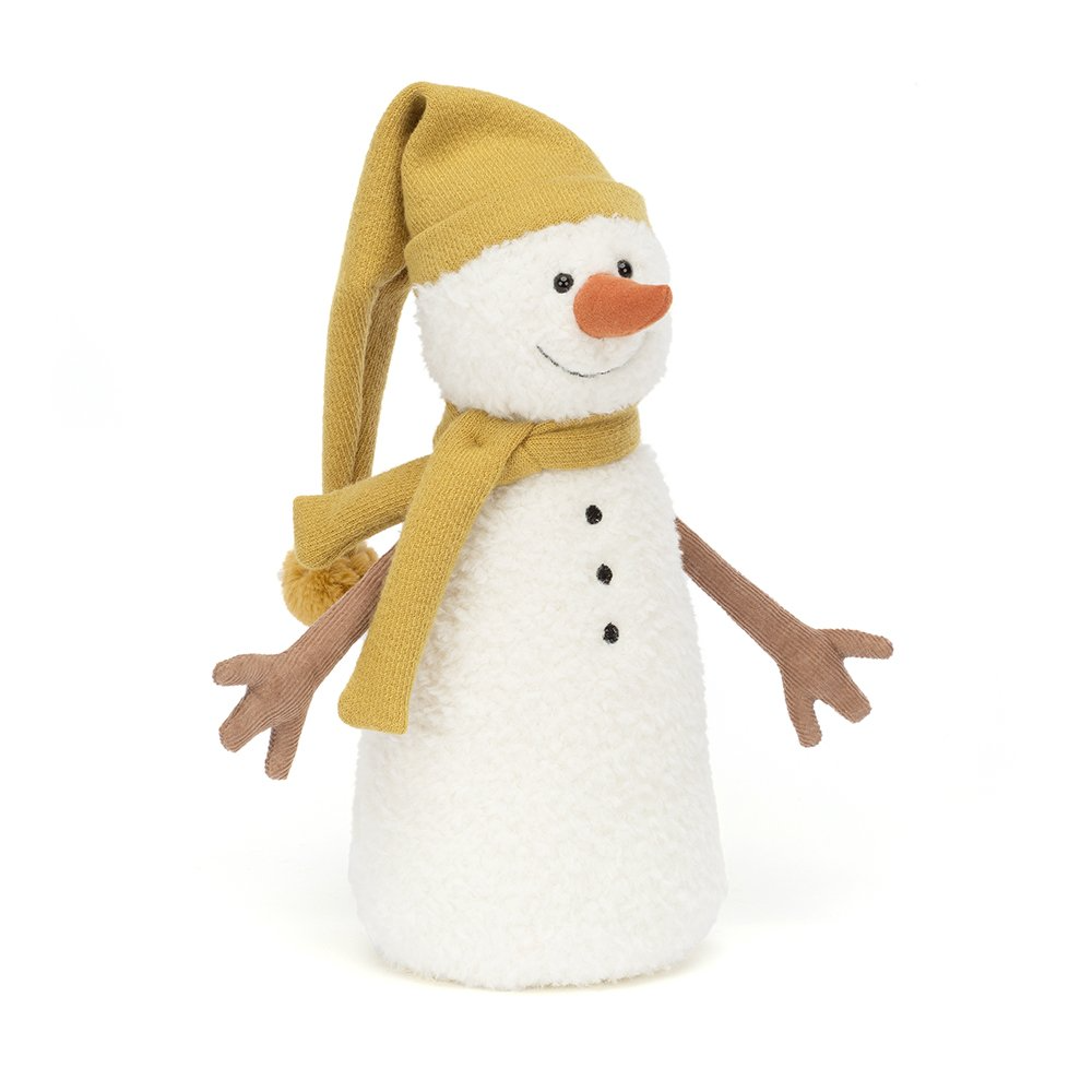 Plush snowman toy with a yellow knitted hat and scarf, orange carrot nose, and black button eyes.