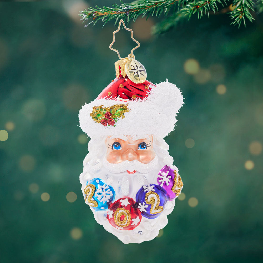 Ho-Ho-Happy Year Gem ornament in red glass with gold glitter swirl pattern and silver cap.