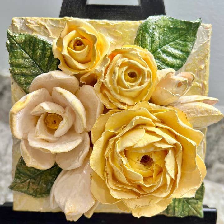 6x6 inch square clay artwork featuring a floral bouquet relief pattern in earthy tones.
