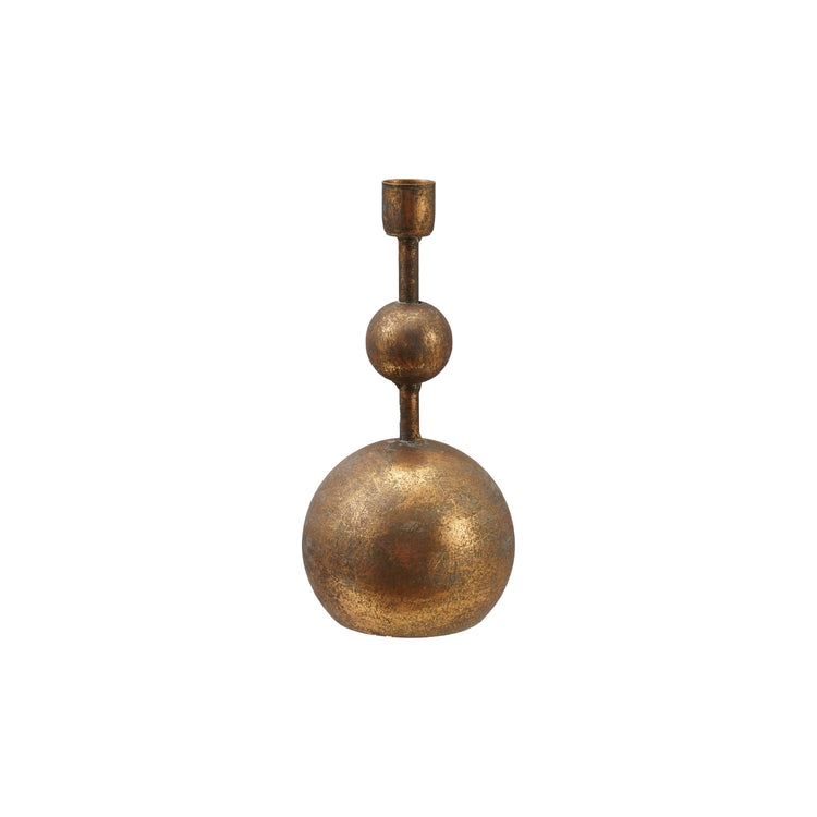 Antique gold metal taper candle holder with a sculptural stacked ball design on a white background.