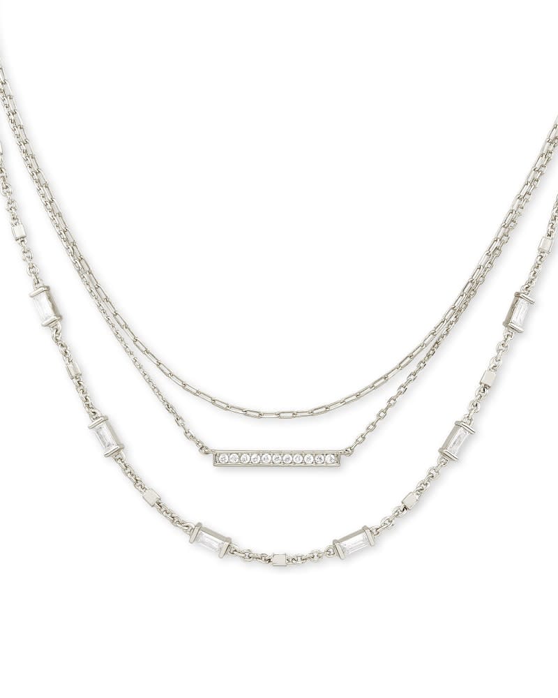 Addison triple strand necklace in yellow gold over brass with lobster claw closure