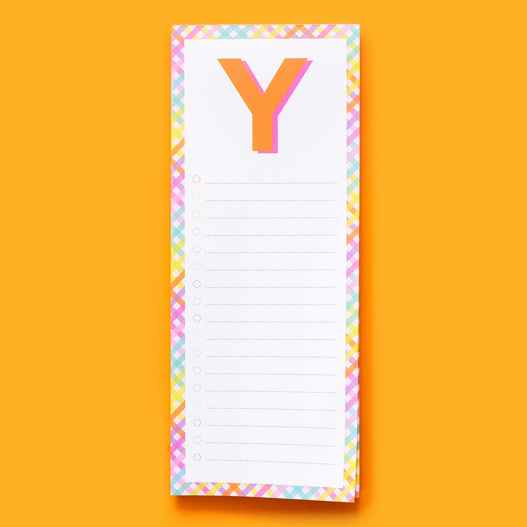 4-inch by 10-inch lined letter pad with magnet on back in shrink-wrap packaging