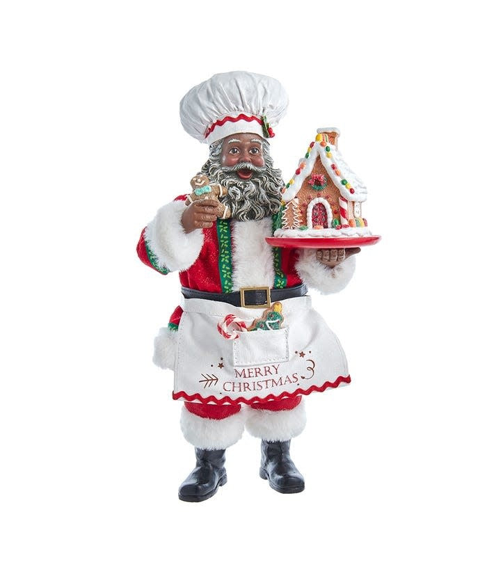 10.5-inch African American Santa figurine dressed as a chef, holding a gingerbread house.