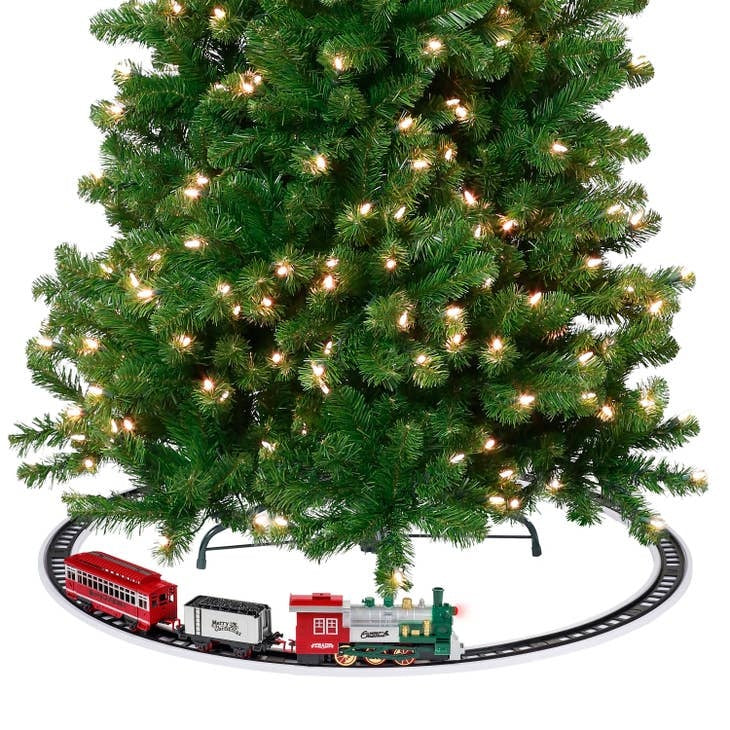 Animated three-car train circling a Christmas tree with suspension clamp