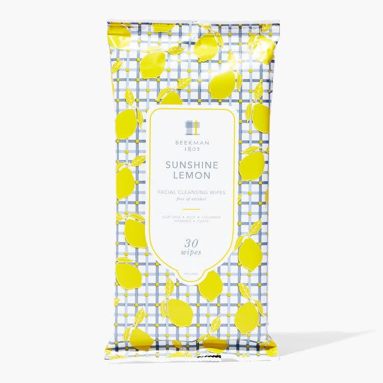 Pack of facial cleansing wipes with a sunshine lemon scent in resealable packaging.