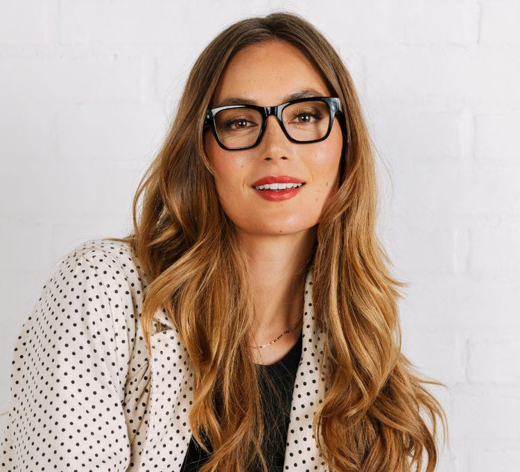 Bernadette eyeglasses with polycarbonate frame in clear finish featuring blue light focus lenses and spring hinges.