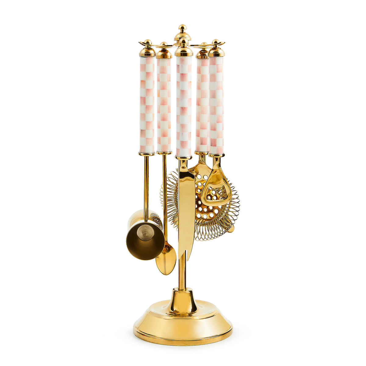 Gold-tone bar tool set with pink and white checkered handles on a matching gold stand.