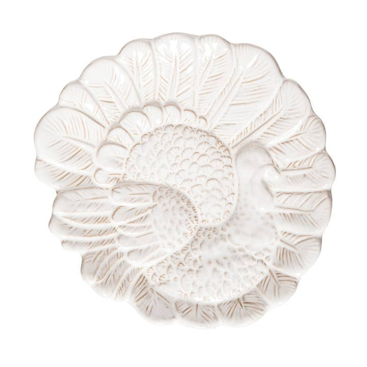 White stoneware decorative plate with a charming turkey motif featuring fall harvest colors.